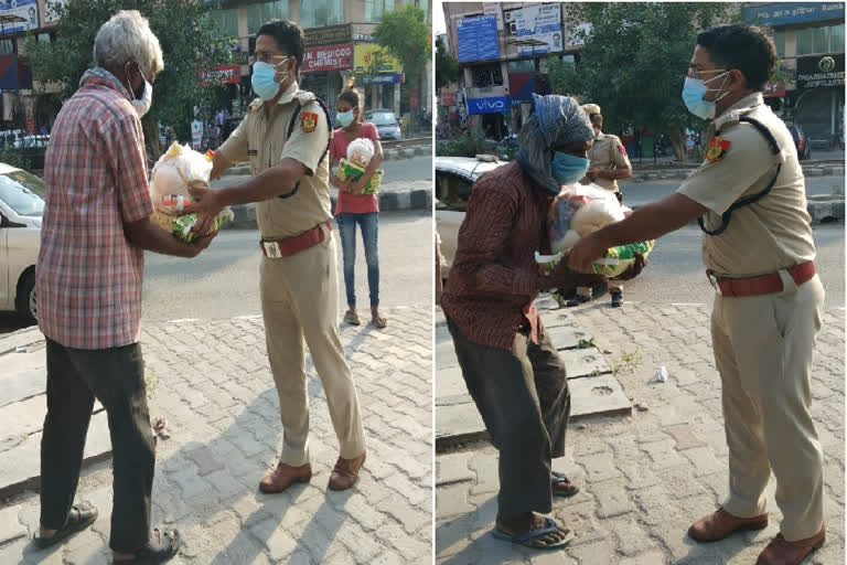 Dwarka police distributed ration packets to laborers