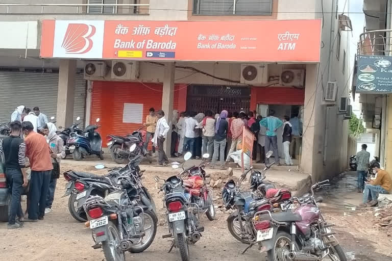 Crowd in front of banks gate