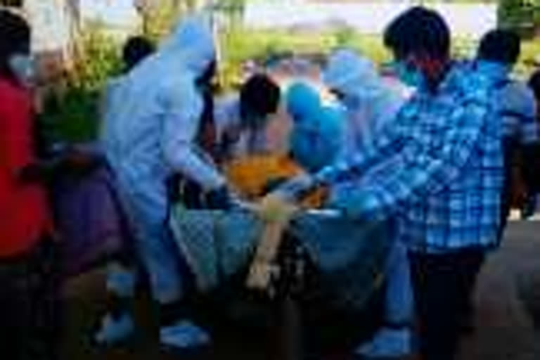 Volunteers conducted the funeral for the old woman