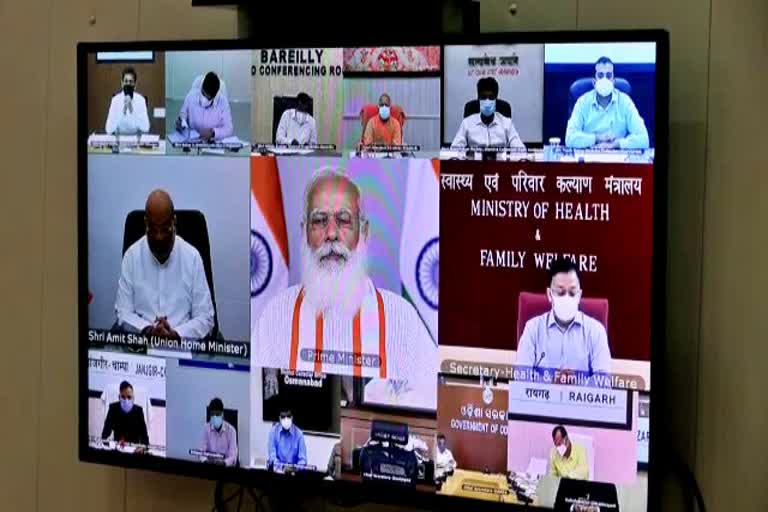 Prime Minister Narendra Modi discussing with Raigarh Collector bhim singh through video conferencing on status of Corona