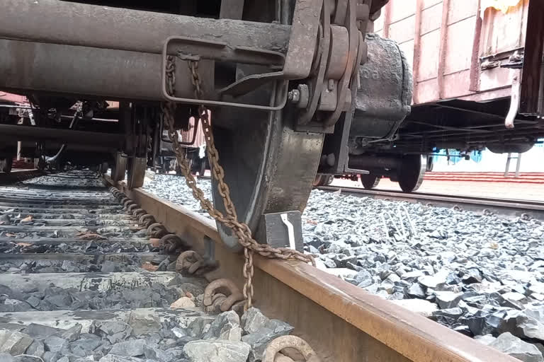 Raiganj alert before cyclone yaas train wheel locked with chain at rail line