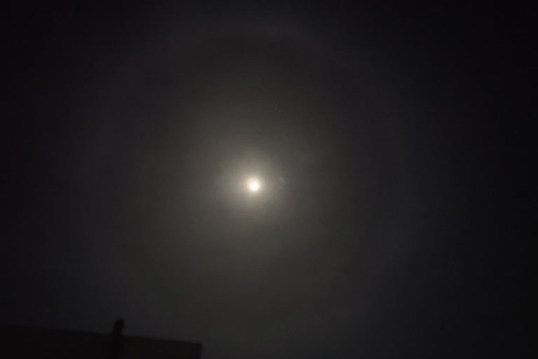 big white colored rings seen around moon in ujjain