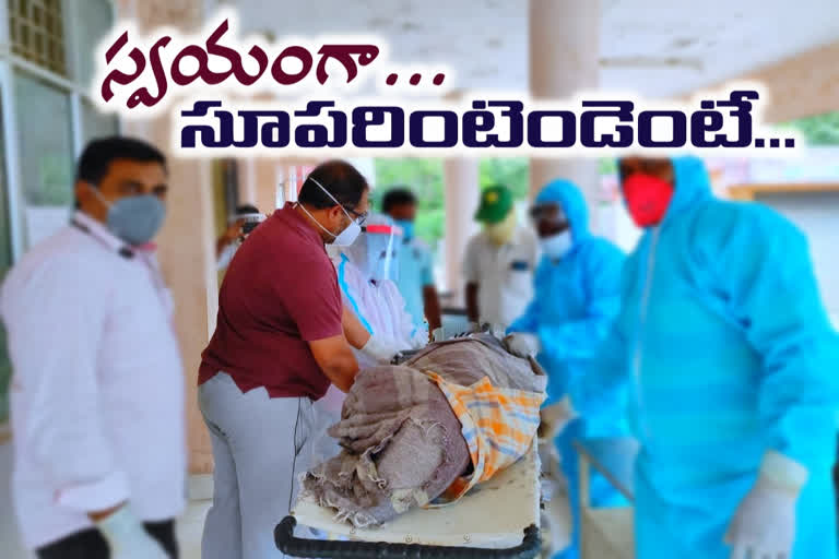 godavarikhani hospital superintendent packed covid patient dead body