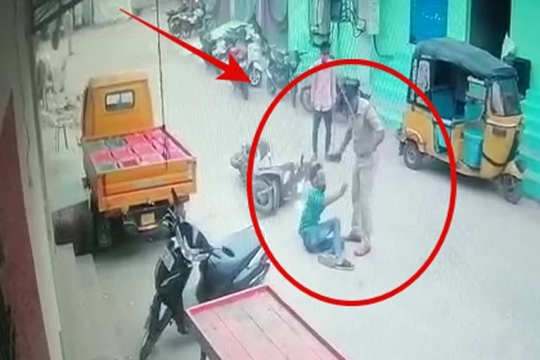 police man attack on boy at kadapa