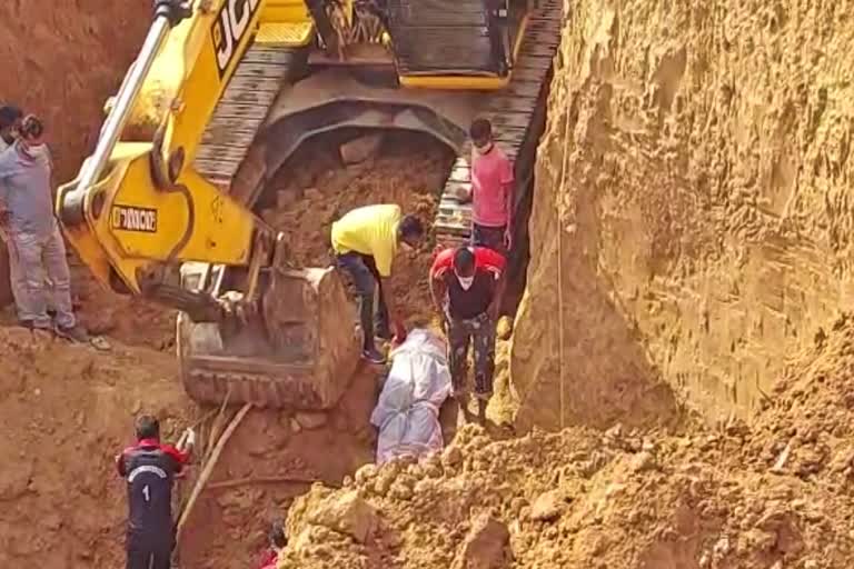 WORKERS BURIED IN DEBRIS