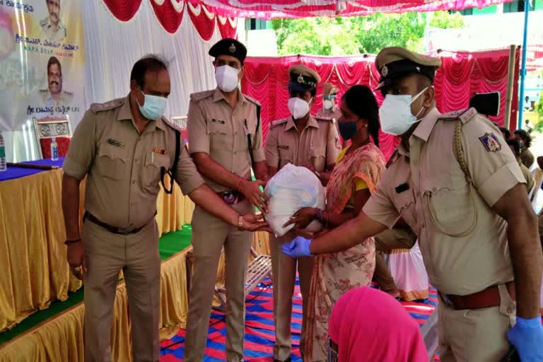 Police staff distribute food kit