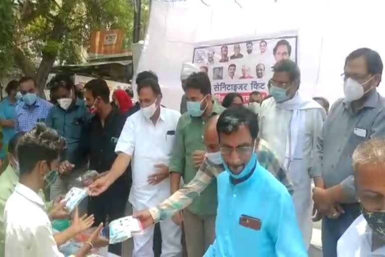 AAP leader Durgesh Pathak distributed sanitizer kit in Delhi