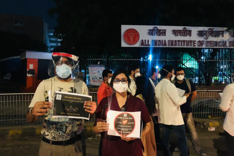 resident doctors of delhi aiims took out candle march in support of MP junior doctors