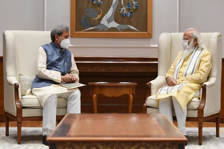 Uttarakhand CM meets PM Modi  apprises him of COVID-19 situation in state  ഉത്തരാഖണ്ഡ് മുഖ്യമന്ത്രി  പ്രധാനമന്ത്രിയുമായി കൂടിക്കാഴ്‌ച്ച  തിരാത്ത് സിംഗ് റാവത്ത്  പ്രധാനമന്ത്രി നരേന്ദ്ര മോദി