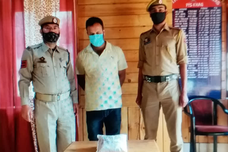 budgam police arrested a drug peddler