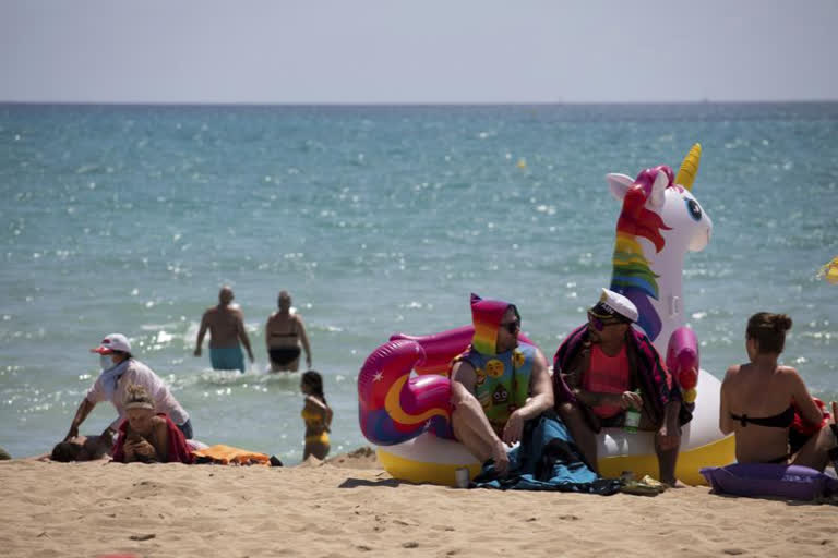 To the beach! Spain opens borders to tourists, cruise ships