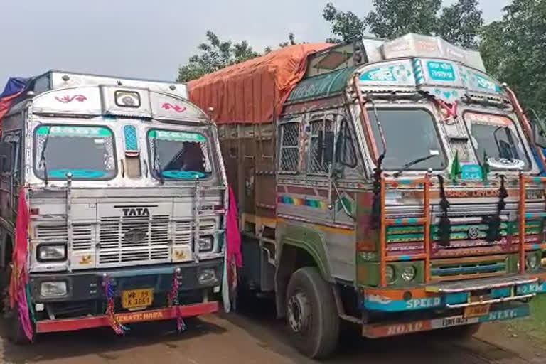 illigal 14 trucks loaded with sand detained at durgapur