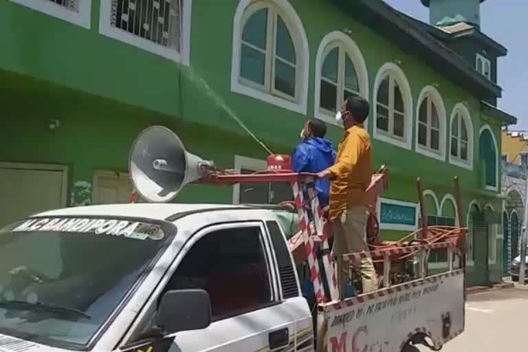 sanitization drive held by bjp bandipora at religious places