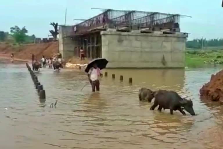 river-water-flowing-over-bridge-on-potamdaga-kulhi-road-in-ramgarh