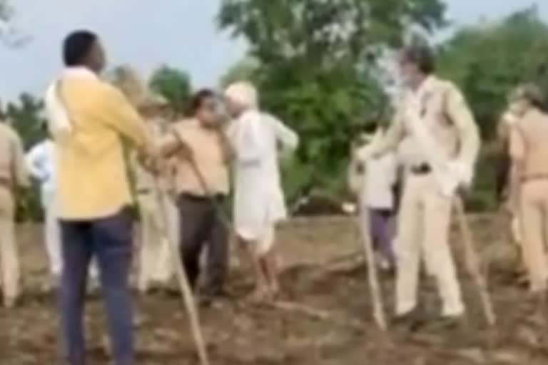 encroachers attacked forest guards who went to remove encroachment