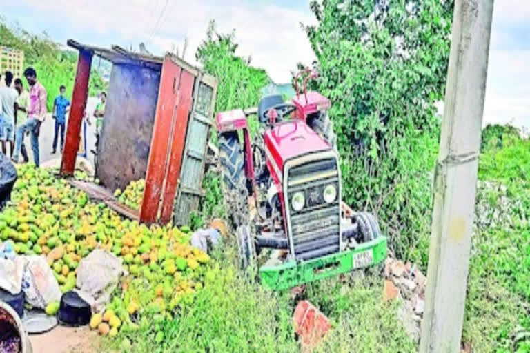 mango tractor turned at penamaluru.. one died