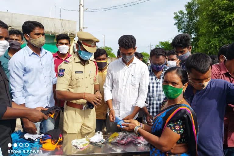 Distribution of masks to villagers in Tekurti village in Illandakunta zone of Karimnagar district