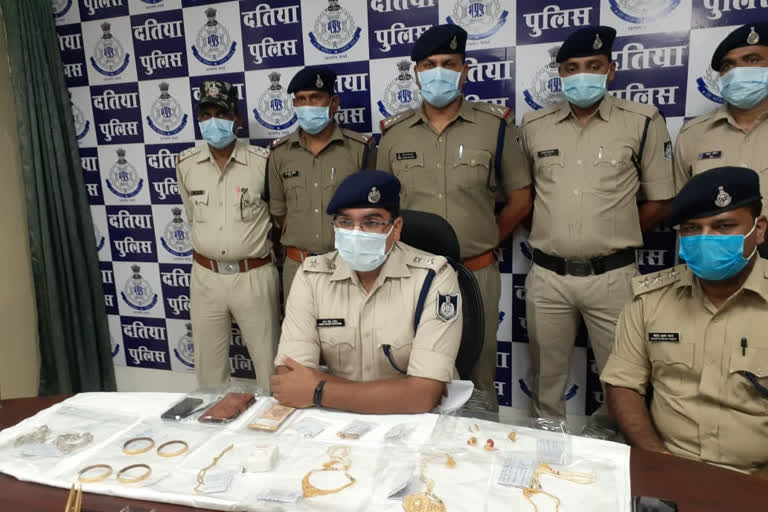Police with recovered items