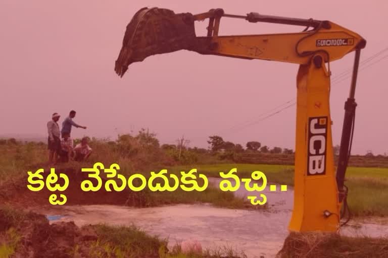 jcb-in-struck-in-farm-well-in-mancherial