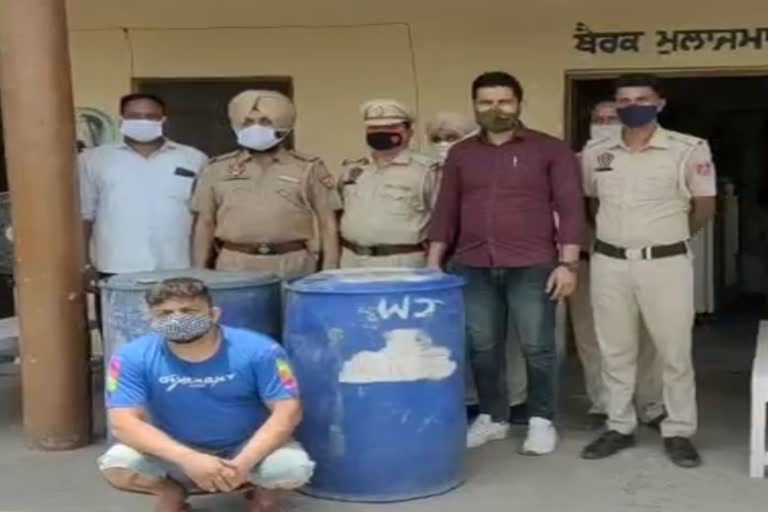 Police arrested a man with 35 cases of liquor