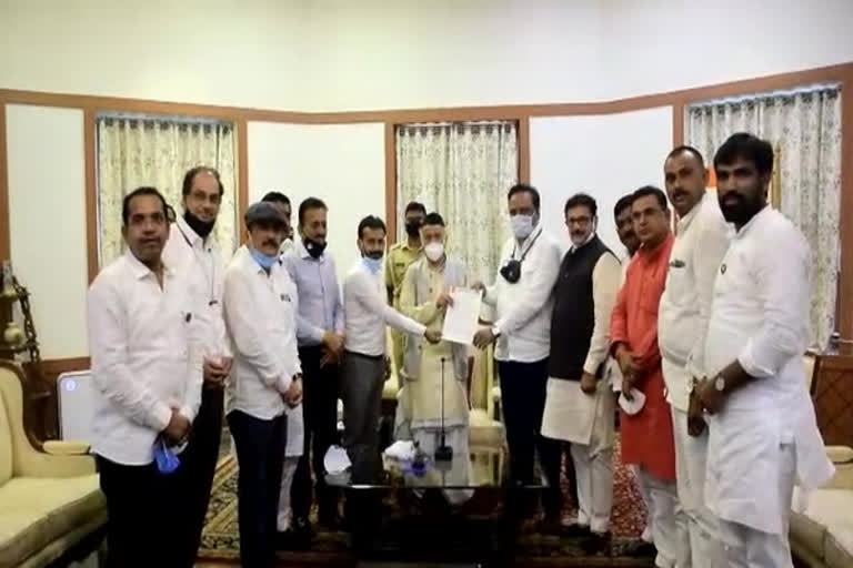 BJP MLAs, who were suspended from Maharashtra Legislative Assembly earlier today, met Governor Bhagat Singh Koshyari in Mumbai.