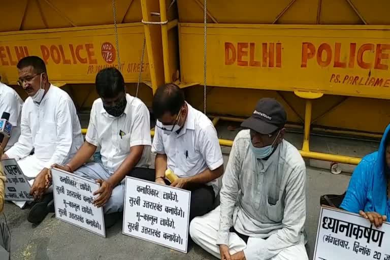 Congress party protest at Jantar Mantar demanding strong land law in Uttarakhand