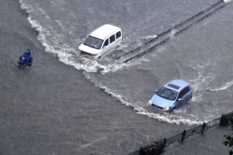 heavy rain in central China  floods in central China  ചൈനയിൽ കനത്ത മഴ  മധ്യ ഹെനാൻ പ്രവിശ്യ