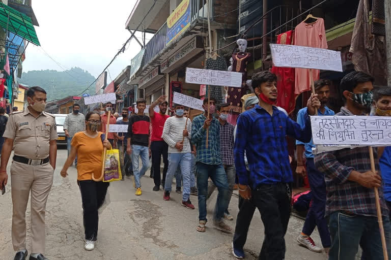 People of Tungal sit in protest against the state government