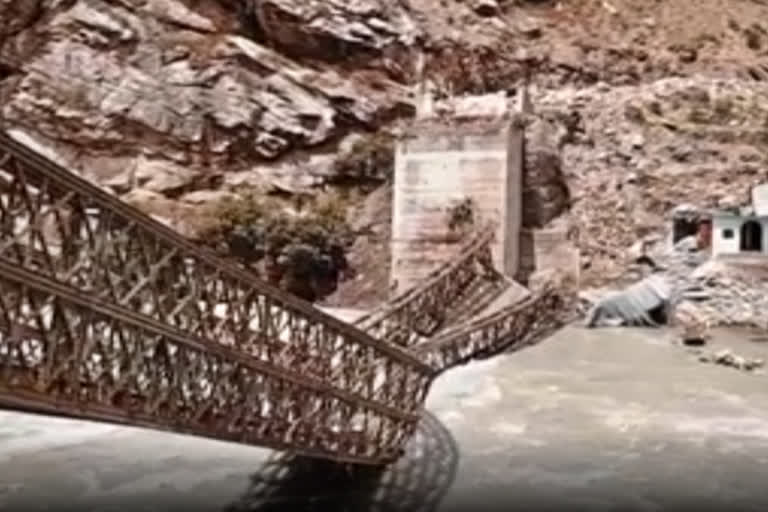A bridge was completely destroyed by falling rocks during the landslide