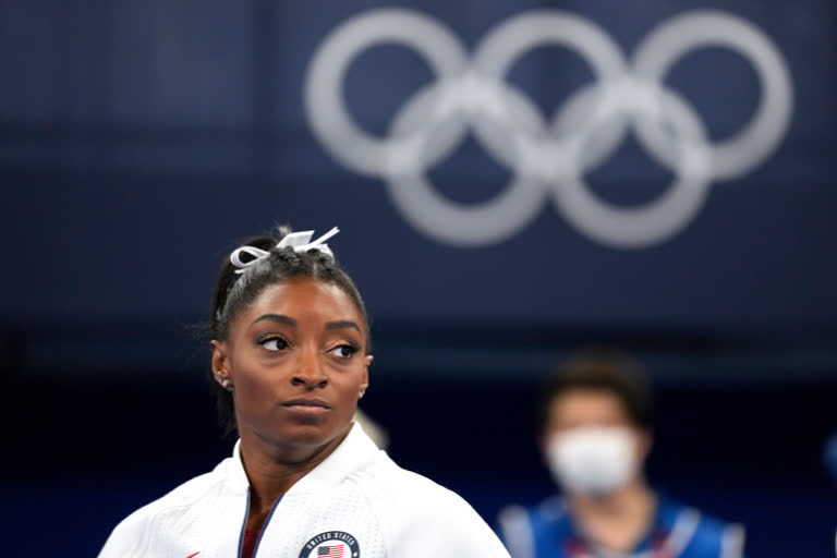 Simone Biles  സിമോണ്‍ ബൈൽസ്  അമേരിക്കൻ ജിംനാസ്റ്റിക്‌സ് സിമോണ്‍ ബൈൽസ്  സിമോണ്‍ ബൈൽസ് പിൻമാറി വാർത്ത  സിമോണ്‍ ബൈൽസ് ഒളിമ്പിക്‌സ്  Simone Biles tokyo Olympics  Simone Biles withdraws  ടോക്കിയോ ഒളിമ്പിക്സ് ലേറ്റസ്റ്റ് ന്യൂസ് സിമോണ്‍ ബൈൽസ്  ടോക്കിയോ ഒളിമ്പിക്സ് 2021  ടോക്കിയോ 2020 വാർത്തകൾ  ടോക്കിയോ ഒളിമ്പിക്സ് ലേറ്റസ്റ്റ് അപ്ഡേറ്റ്  ഒളിമ്പിക്സ് വാർത്തകൾ  ടോക്കിയോ ഒളിമ്പിക്സ് 2020  ടോക്കിയോ ഒളിമ്പിക്സ് ലേറ്റസ്റ്റ് അപ്ഡേറ്റ്  ടോക്കിയോ ഒളിമ്പിക്സ് ലേറ്റസ്റ്റ് ന്യൂസ്  അമേരിക്കൻ ജിംനാസ്റ്റിക്‌സ്  Simone Biles withdraws from all-around competition