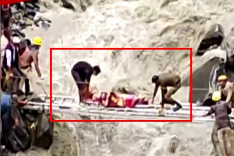 Rescue team carries injured person in HP Goes Viral