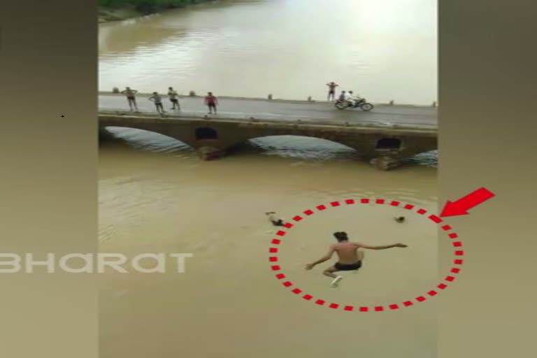 youth jumping into sindh river
