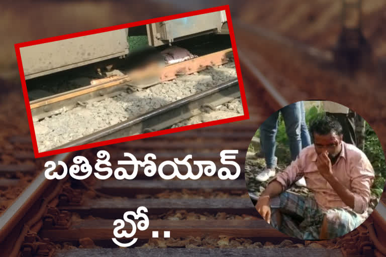 man falls under train