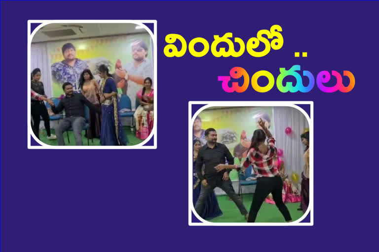 Young men dance with dancers during birthday celebrations