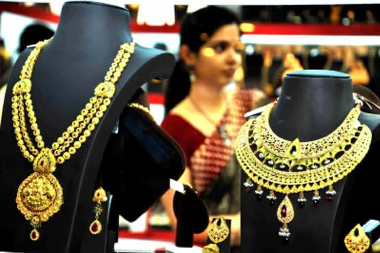 Gold price has dipped marginally by Rs 31 to Rs 46,891 per 10 grams