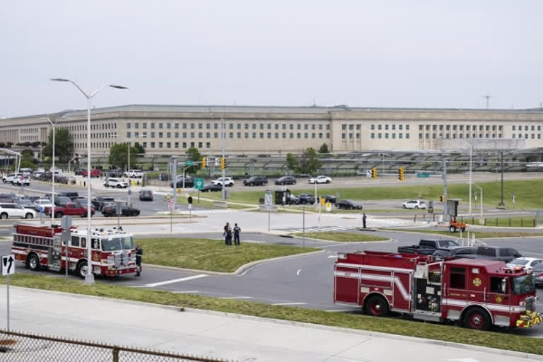 Emergency vehicles are seen outside the Pentagon Metro area Tuesday