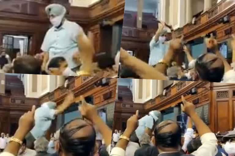 Rajya Sabha  Congress MP Pratap Singh Bajwa  ruckus in Parliament  Monsoon Session  Congress MP throws rule book at Rajya Sabha Chair  Congress MP Pratap Singh Bajwa  വിവാദ വിഷയങ്ങള്‍ ചര്‍ച്ച ചെയ്യണം  രാജ്യസഭ സ്‌പീക്കര്‍ക്കു നേരെ റൂള് ബുക്ക് വലിച്ചെറിഞ്ഞ്  രാജ്യസഭ സ്‌പീക്കര്‍  കോണ്‍ഗ്രസ് എം.പി  ചൊവ്വാഴ്‌ച നാടകീയ രംഗങ്ങള്‍  പെഗാസസ്  കോൺഗ്രസ് എം.പി പ്രതാപ് സിങ് ബജ്‌വ  പ്രതാപ് സിങ് ബജ്‌വ