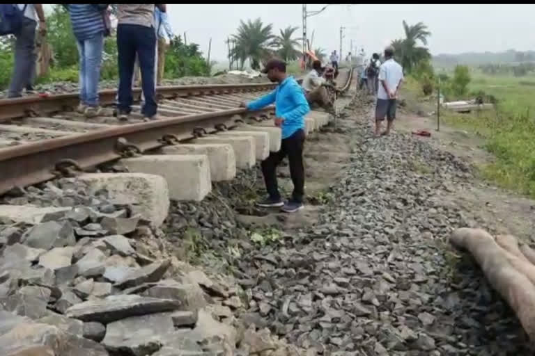 train-service-stopped-due-to-land-slide-beside-rail-line-at-jangipur