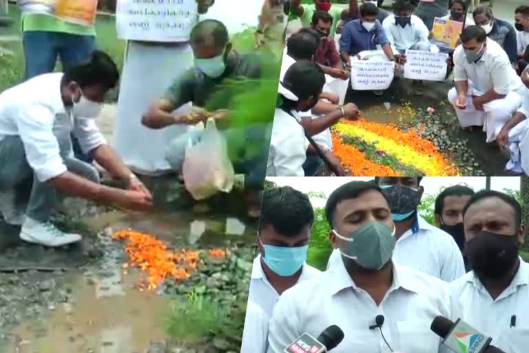 Youth Congress  ona pookkalam protest  protest against road gutter in goshree bridge  goshree bridge  യൂത്ത് കോൺഗ്രസ് മുളവുകാട് മണ്ഡലം കമ്മിറ്റി  ബോൾഗാട്ടിയില്‍ നിന്നും വൈപ്പിനിലേക്കുള്ള ഗോശ്രീ പാലം  യൂത്ത് കോൺഗ്രസ് മുളവുകാട് മണ്ഡലം കമ്മിറ്റി  Youth Congress Mulavukadu Constituency Committee