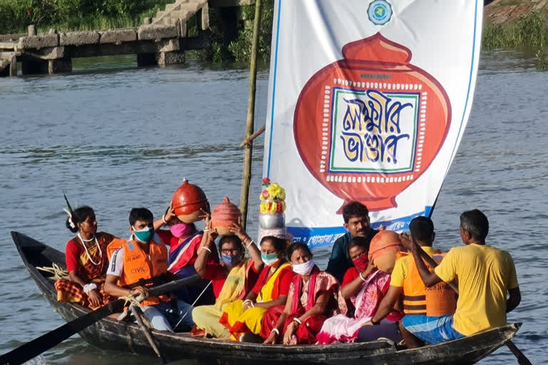 Government workers reach remote areas of Sundarban by boats for provide Lakshmi Bhandar service in south 24 Pargana