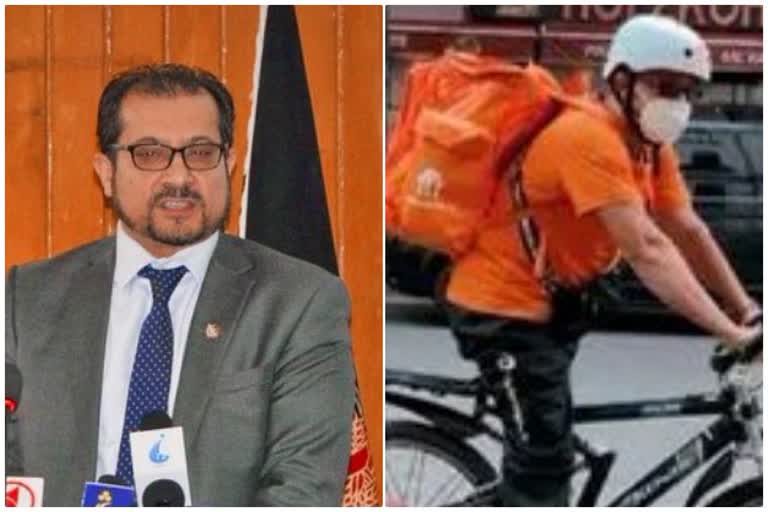 Afghanistan's former communications minister Sayed Ahmad Shah Saadat is now a driver for the Lieferando delivery service in Leipzig