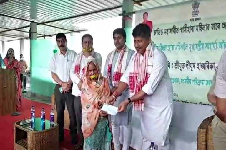 cheque-of-cm-relief-scheme-distributed-at-biswanath