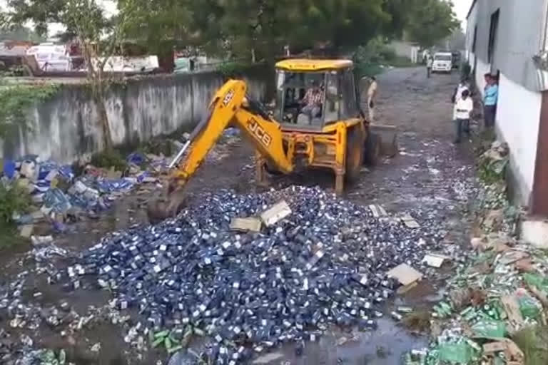 Administration bulldozers on liquor bottles