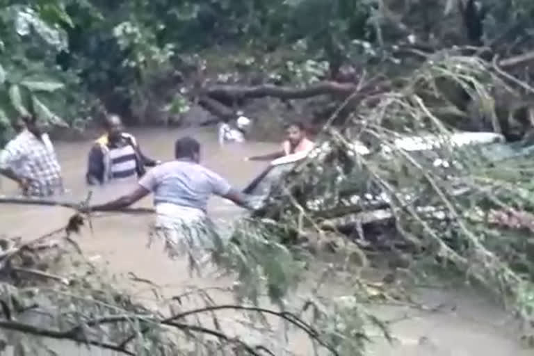 Car washed away, dead body found