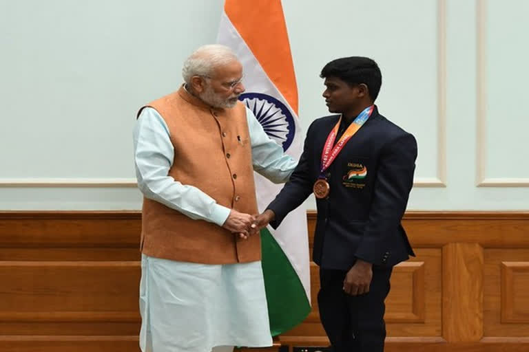 PM Modi congratulates Mariyappan Thangavelu and Sharad Kumar