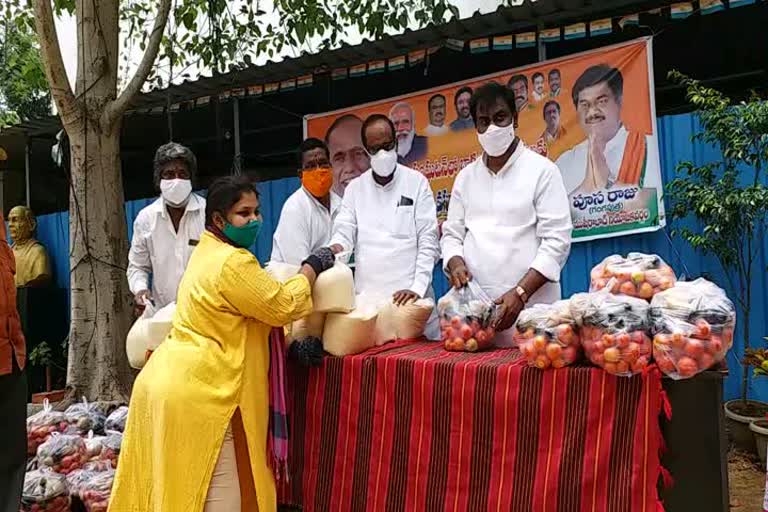 BJP OBC Morcha National President Dr Laxman distributed daily commodities to handicapped people