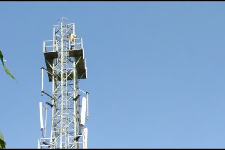 mentally deranged young man attempted suicide by climbing mobile tower