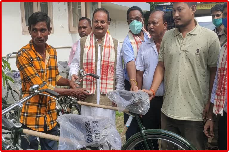 mla Jitu Goswami distribute Cycle to tea tribe people