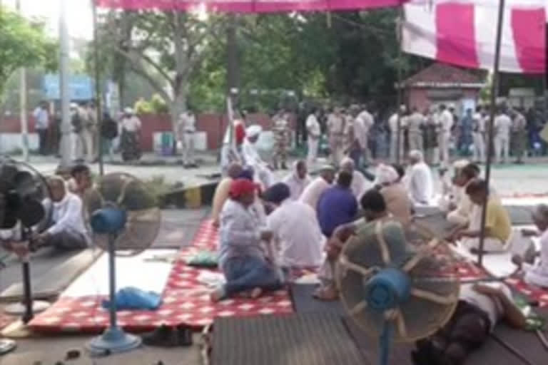 Farmers continue their demonstration outside mini secretariat in Karnal,