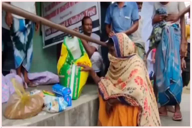 Distribution of food items in Abhayapuri in flood affected people